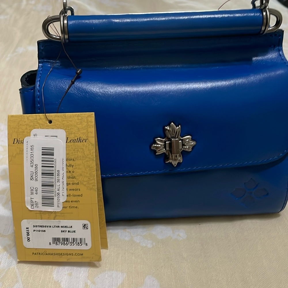 New Sky blue leather Patricia Nash crossbody purse.
